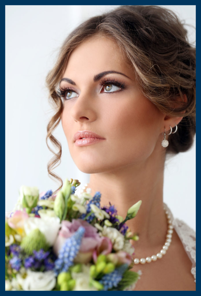 Wedding. Beautiful bride with bouquet